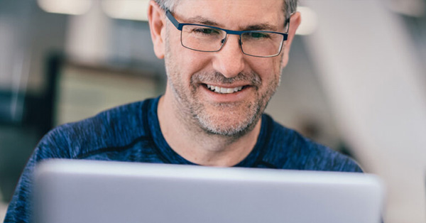 Man staring at computer screen