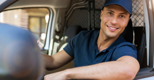 Delivery driver staring out of cab window